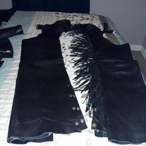 Leather jacket, chaps and vest